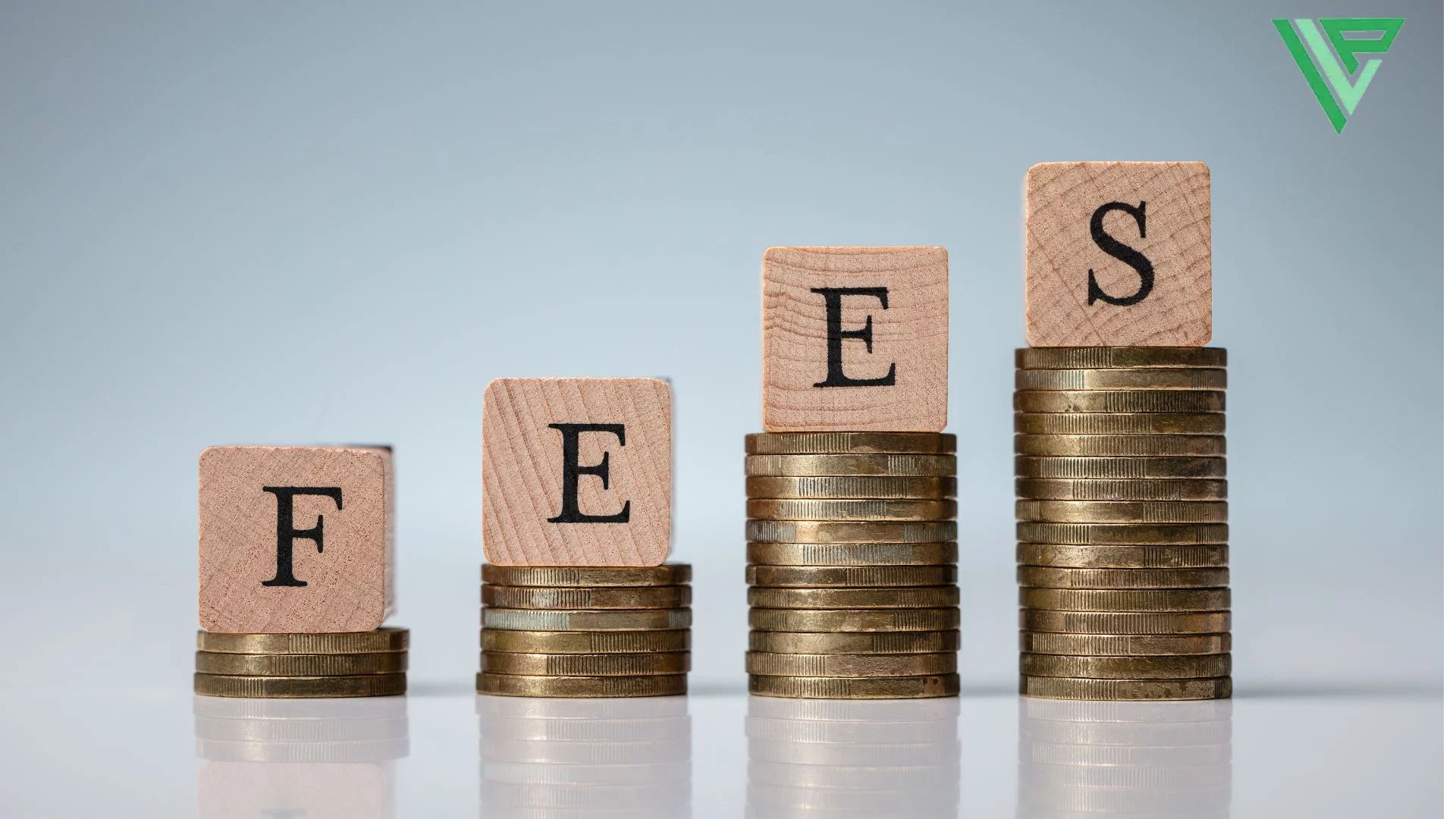 Common Fees and Questions for Hiring a Personal Injury Attorney - stacks of coins with the word fees written on them